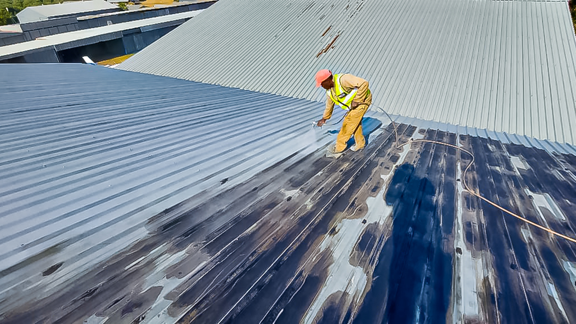 Sicon Group team painting a tile roof in Pretoria, Gauteng